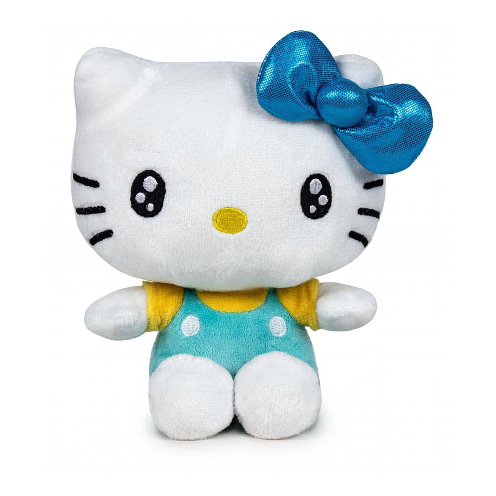 Peluche Hello Kitty 16 cm édition 50e anniversaire, en salopette turquoise à pois, t-shirt jaune, nœud bleu brillant et yeux étoilés.