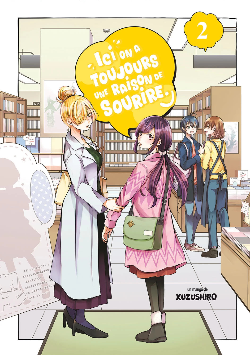 manga Ici on a toujours une raison de sourire tome 2, avec deux jeunes femmes se tenant par le bras dans une librairie, entourées d'étagères remplies de livres.