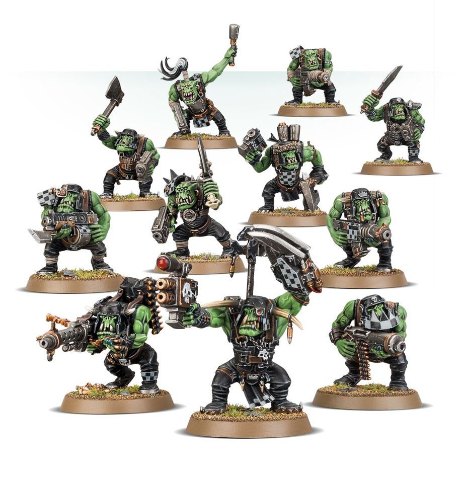 Boîte Warhammer 40K – Boyz Orks, 11 figurines de peaux-vertes armées pour le combat, idéales pour les armées Orks.