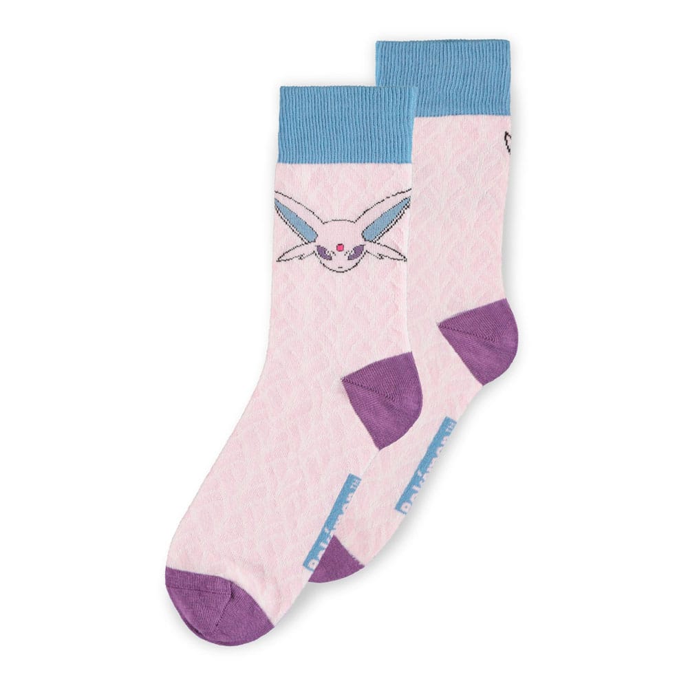 Pack de trois chaussettes Pokémon représentant Évoli, Mentali en rose et Noctali en noir avec embouts colorés assortis.