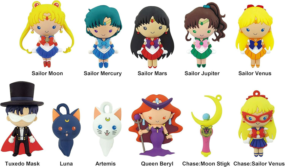 série 1 des Sailor Moon Figural Keyrings, montrant Sailor Moon, Tuxedo Mask, les Sailor Senshi et les chats Luna & Artemis dans un style chibi coloré et kawaii.