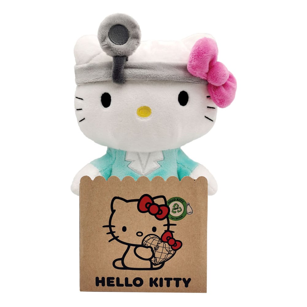 Peluche Hello Kitty habillée en docteur avec blouse turquoise et bandeau médical, packaging carton décoré
