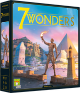 Boîte du jeu de société 7 Wonders avec illustration de cité antique, statue, phare et pyramide sur fond de ciel coloré.