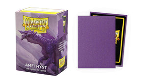 Boîte Dragon Shield Matte Sparkle Amethyst contenant 100 protège-cartes standard violets scintillants avec finition mate.