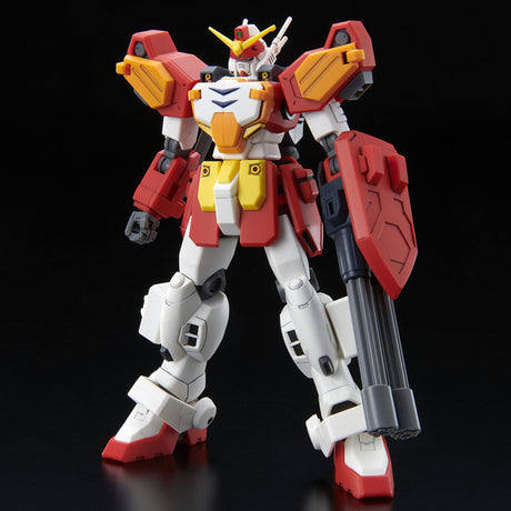 Gunpla HG 1/144 Gundam Heavyarms Custom Endless Waltz équipé de double gatling, en pose dynamique.