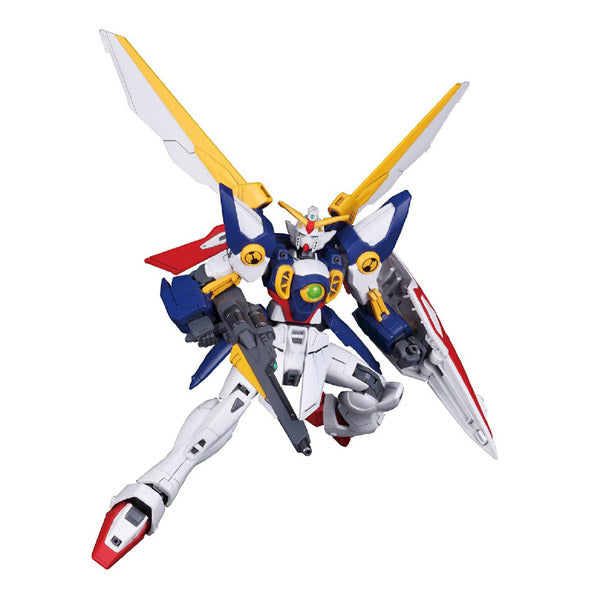 Maquette Gunpla HG 1/144 Wing Gundam avec ailes jaunes et blanches, fusil, bouclier et pose dynamique sur fond blanc.