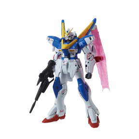 Maquette Gunpla MG 1/100 V2 Gundam Ver. Ka blanche, bleue, jaune et rouge avec fusil et effet d’aile rose sur fond blanc.