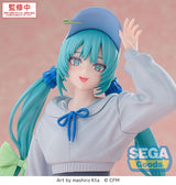 Figurine Hatsune Miku Luminasta Conceptual Series Vol.2 par SEGA, posant en tenue bleue avec longues couettes turquoise.