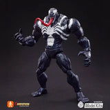 Boîte Marvel Rivals Blokees Champion Class Venom avec visuel du symbiote noir et blanc et tentacules, sur fond jaune et bleu.