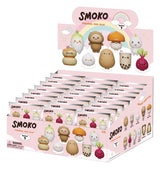 Visuel Smoko Figural Bag Clip Series 1 avec plusieurs porte-clés 3D kawaii à collectionner, dont champignon, bubble tea, radis et licorne.