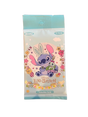 Booster de cartes Disney Lilo & Stitch avec Stitch assis entouré de fleurs dans un packaging pastel.