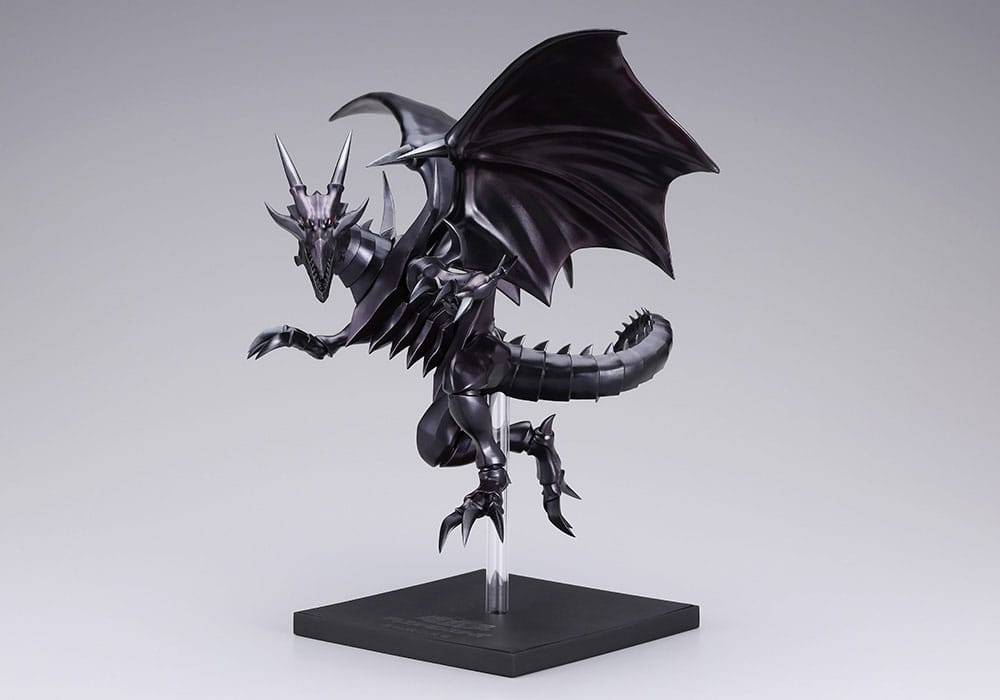 Figurine Yu-Gi-Oh! Oshi Works Dragon Noir aux Yeux Rouges de 24 cm, dragon noir aux ailes déployées sur socle transparent.