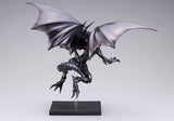 Figurine Yu-Gi-Oh! Oshi Works Dragon Noir aux Yeux Rouges de 24 cm, dragon noir aux ailes déployées sur socle transparent.