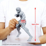 Figurine Baki Grandista Hanma Baki par Banpresto, représentant Baki en posture de combat avec musculature détaillée, short rouge et bandages blancs.