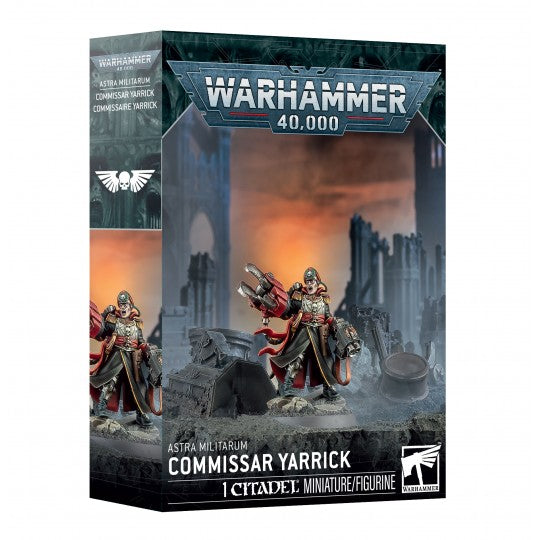Boîte Warhammer 40,000 Astra Militarum Commissaire Yarrick avec figurine armée dans un décor de ruines urbaines.