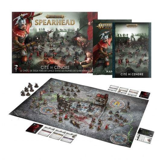 Boîte Warhammer Age of Sigmar Spearhead Cité de Cendre en français avec plateau, cartes, livrets et figurines sur fond blanc.