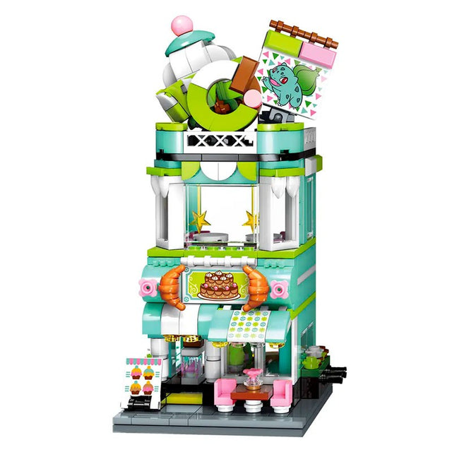Set de construction Pokémon Keeppley Bulbasaur Dessert House, boutique de desserts en briques vertes et turquoise avec vitrines transparentes, enseigne Bulbizarre, pâtisseries et décor kawaii.